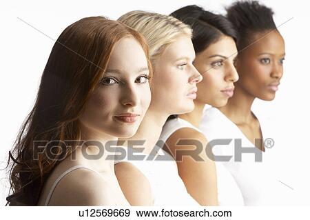 Portrait Of Four Attractive Young Women In Studio Standing In Line View Large Photo Image Stock Photo - Portrait Of Four Attractive Young Women In Studio Standing In Line. Fotosearch