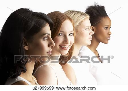 Portrait Of Four Attractive Young Women In Studio Standing In Line View Large Photo Image Stock Photo - Portrait Of Four Attractive Young Women In Studio Standing In Line. Fotosearch