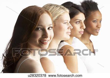 Portrait Of Four Attractive Young Women In Studio Standing In Line View Large Photo Image Stock Photo - Portrait Of Four Attractive Young Women In Studio Standing In Line. Fotosearch