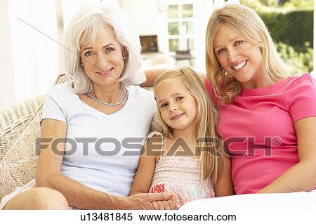 Portrait Of Grandmother, Daughter And Granddaughter Relaxing On Sofa View Large Photo Image Stock Photography - Portrait Of Grandmother, Daughter And Granddaughter Relaxing On Sofa. Fotosearch
