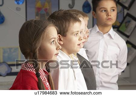 Portrait Of Group Of Primary Schoolchildren Standing In Classroom View Large Photo Image Stock Image - Portrait Of Group Of Primary Schoolchildren Standing In Classroom. Fotosearch