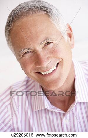 Stock Photograph - Portrait Of Happy Senior man. Fotosearch