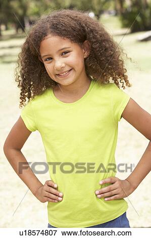 Portrait Of Happy Young Girl In Park View Large Photo Image Stock Photo - Portrait Of Happy Young Girl In Park. Fotosearch
