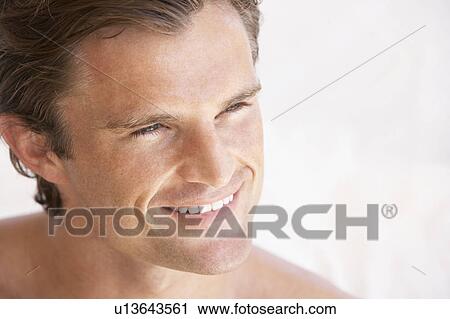 Stock Image - Portrait Of Happy Young Man. Fotosearch