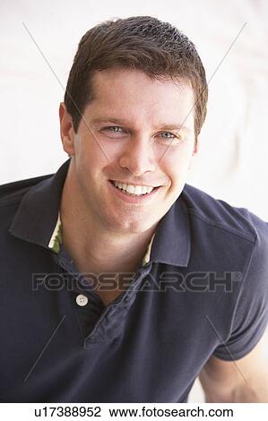 Stock Image - Portrait Of Happy Young Man. Fotosearch
