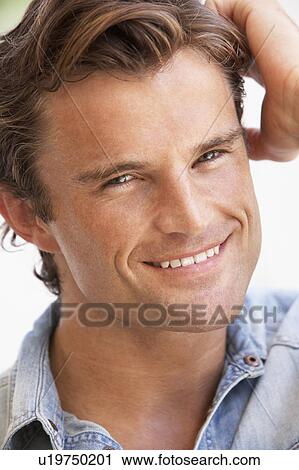 Stock Image - Portrait Of Happy Young Man. Fotosearch