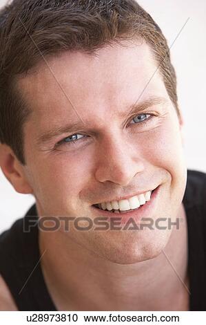 Stock Image - Portrait Of Happy Young Man. Fotosearch