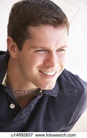 Stock Photo - Portrait Of Happy Young Man. Fotosearch