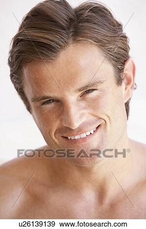 Stock Photo - Portrait Of Happy Young Man. Fotosearch