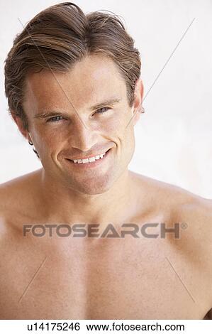 Stock Photograph - Portrait Of Happy Young Man. Fotosearch