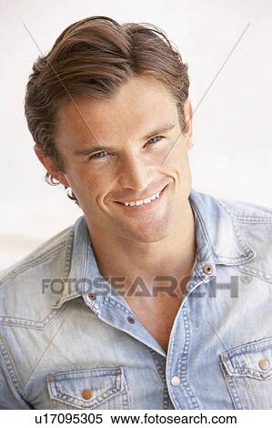 Stock Photography - Portrait Of Happy Young Man. Fotosearch