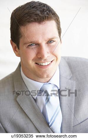 Stock Photography - Portrait Of Happy Young Man. Fotosearch
