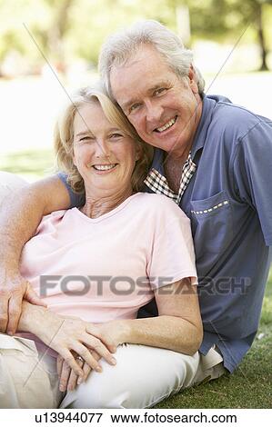 Portrait Of Romantic Senior Couple In Park View Large Photo Image Stock Photo - Portrait Of Romantic Senior Couple In Park. Fotosearch