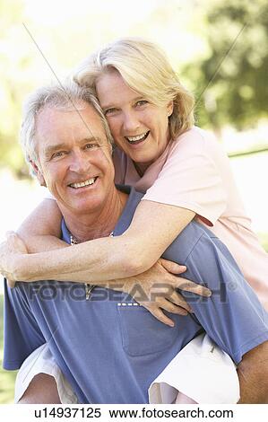 Portrait Of Romantic Senior Couple In Park View Large Photo Image Stock Photography - Portrait Of Romantic Senior Couple In Park. Fotosearch