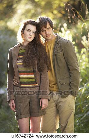Picture - Portrait Of Romantic Young Couple In Autumn Landscape. Fotosearch