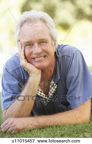 Stock Photo - Portrait Of Senior Man In Park. Fotosearch