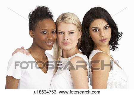Stock Image - Portrait Of Three Attractive Young Women In Studio. Fotosearch