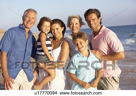 Portrait Of Three Generation Family On Beach Holiday View Large Photo Image Picture - Portrait Of Three Generation Family On Beach Holiday. Fotosearch