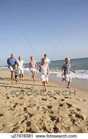 Portrait Of Three Generation Family On Beach Holiday View Large Photo Image Stock Image - Portrait Of Three Generation Family On Beach Holiday. Fotosearch