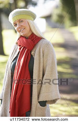 Portrait Of Woman Outdoors In Autumn Landscape View Large Photo Image Stock Image - Portrait Of Woman Outdoors In Autumn Landscape. Fotosearch