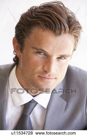 Stock Photo - Portrait Of Young Businessman. Fotosearch