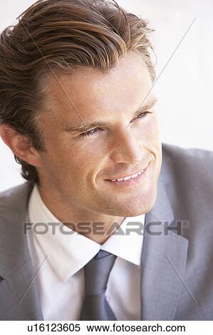 Stock Photography - Portrait Of Young Businessman. Fotosearch