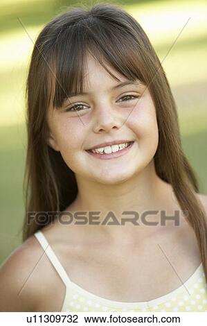 Portrait Of Young Girl In Park View Large Photo Image Stock Image - Portrait Of Young Girl In Park. Fotosearch