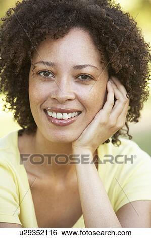 Portrait Of Young Woman In Park View Large Photo Image Stock Photograph - Portrait Of Young Woman In Park. Fotosearch