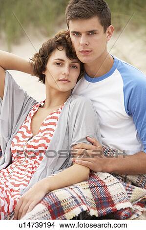 Romantic Young Couple Embracing On Beach View Large Photo Image Picture - Romantic Young Couple Embracing On Beach. Fotosearch