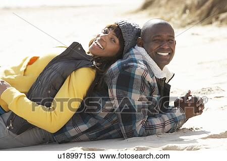 Romantic Young Couple On Winter Beach View Large Photo Image Stock Image - Romantic Young Couple On Winter Beach. Fotosearch