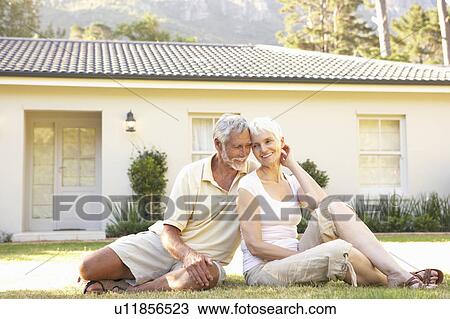 Senior Couple sitting Outside Dream Home View Large Photo Image Stock Image - Senior Couple sitting Outside Dream Home. Fotosearch