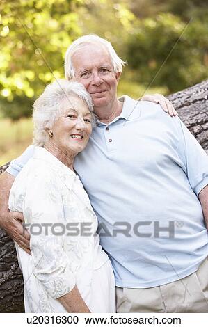 Senior Couple Walking In Park View Large Photo Image Stock Image - Senior Couple Walking In Park. Fotosearch