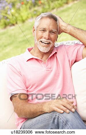 Senior Man Relaxing In Garden View Large Photo Image Stock Photograph - Senior Man Relaxing In Garden. Fotosearch