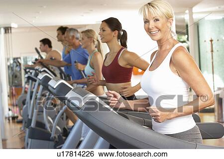 Senior Woman On Running Machine In Gym View Large Photo Image Stock Photograph - Senior Woman On Running Machine In Gym. Fotosearch