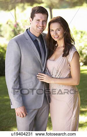 Smartly Dressed Young couple in park View Large Photo Image Stock Image - Smartly Dressed Young couple in park. Fotosearch