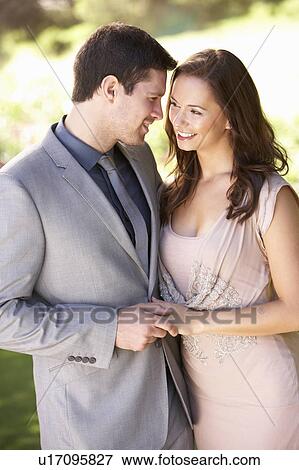 Smartly Dressed Young couple in park View Large Photo Image Stock Photo - Smartly Dressed Young couple in park. Fotosearch