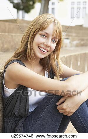 Smiling Teenage Student Sitting Outside On College Steps View Large Photo Image Stock Photograph - Smiling Teenage Student Sitting Outside On College Steps. Fotosearch
