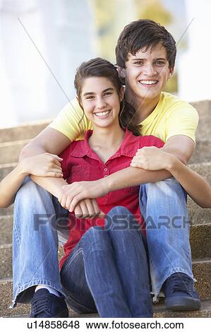 Teenage Couple Sitting On College Steps Outside View Large Photo Image Stock Photo - Teenage Couple Sitting On College Steps Outside. Fotosearch