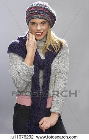 Teenage Girl Wearing Warm Winter Clothes In Studio View Large Photo Image Stock Image - Teenage Girl Wearing Warm Winter Clothes In Studio. Fotosearch