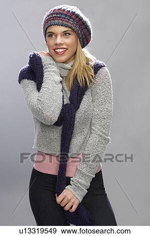 Teenage Girl Wearing Warm Winter Clothes In Studio View Large Photo Image Stock Photo - Teenage Girl Wearing Warm Winter Clothes In Studio. Fotosearch