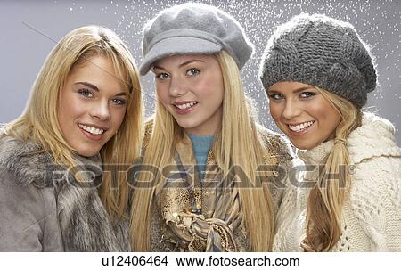 Three Fashionable Teenage Girls Wearing Cap And Knitwear In Studio View Large Photo Image Picture - Three Fashionable Teenage Girls Wearing Cap And Knitwear In Studio. Fotosearch