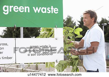 Woman At Recycling Centre Disposing Of Clothing View Large Photo Image Stock Image - Woman At Recycling Centre Disposing Of Clothing. Fotosearch