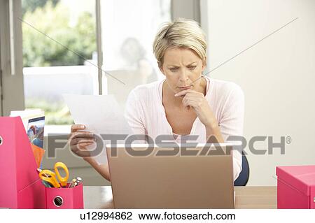 Woman Using Laptop At Home View Large Photo Image Stock Image - Woman Using Laptop At Home. Fotosearch
