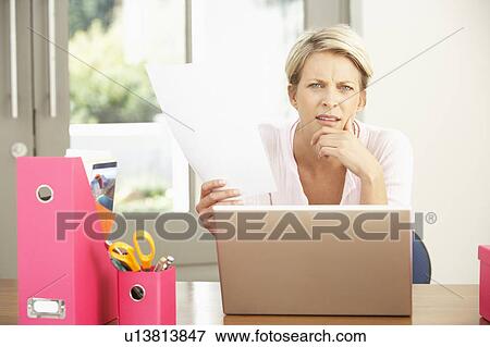 Woman Using Laptop At Home View Large Photo Image Stock Photo - Woman Using Laptop At Home. Fotosearch