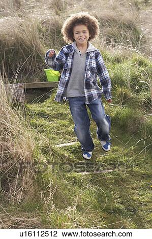 Young Boy Carrying Fishing Net At Seaside View Large Photo Image Stock Image - Young Boy Carrying Fishing Net At Seaside. Fotosearch