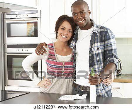 Young Couple Cleaning Cleaning Modern Kitchen View Large Photo Image Stock Photo - Young Couple Cleaning Cleaning Modern Kitchen . Fotosearch