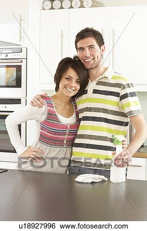 Young Couple Cleaning Cleaning Modern Kitchen View Large Photo Image Stock Photograph - Young Couple Cleaning Cleaning Modern Kitchen . Fotosearch