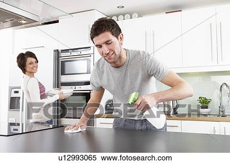 Young Couple Cleaning Cleaning Modern Kitchen View Large Photo Image Stock Photography - Young Couple Cleaning Cleaning Modern Kitchen . Fotosearch