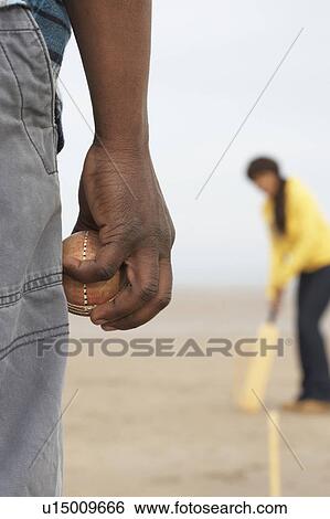 Young Couple Playing Cricket On Autumn Beach Holiday View Large Photo Image Stock Photograph - Young Couple Playing Cricket On Autumn Beach Holiday. Fotosearch