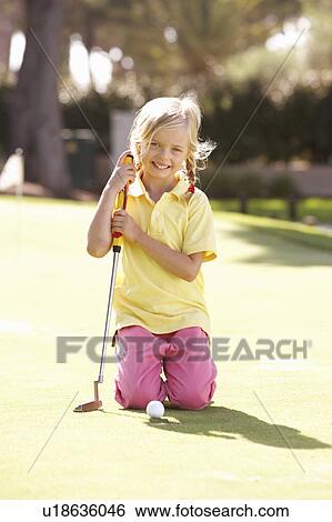 Young Girl Practising Golf On Putting On Green View Large Photo Image Stock Photograph - Young Girl Practising Golf On Putting On Green. Fotosearch